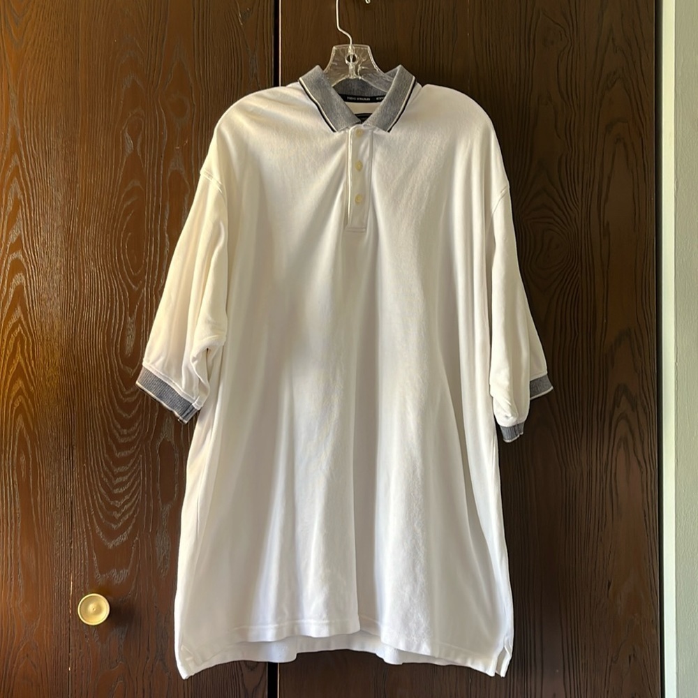 Steve Stricker men’s white golf shirt with navy trim. Size XL long.